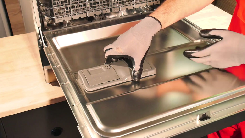 Enlever la boîte à produit de son emplacement