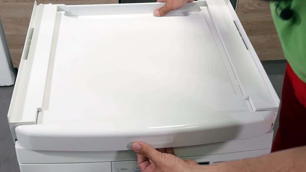 Positionner le plateau sur le lave-linge